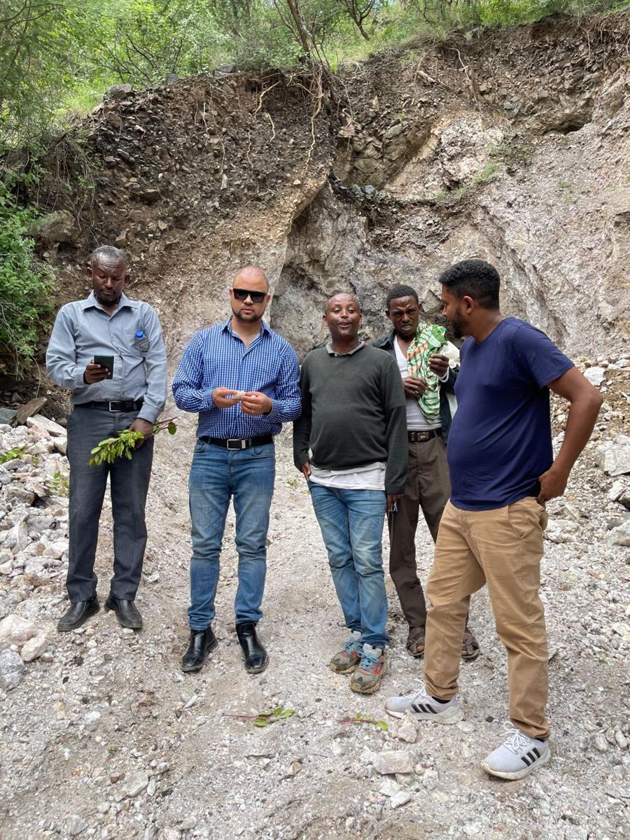 Tomas Vacilevich with the project team at the mining site